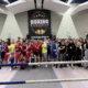 Een groepsfoto van Team Boxing University Breda tijdens de afsluiting van het seizoen "End of Season Boxing Party" waarbij het boksen in Breda met een leuke en gezellige activiteit werd afgesloten met boksers en leden van de boksclub tegen elkaar een vriendschappelijke sparring en wedstrijd boksten.